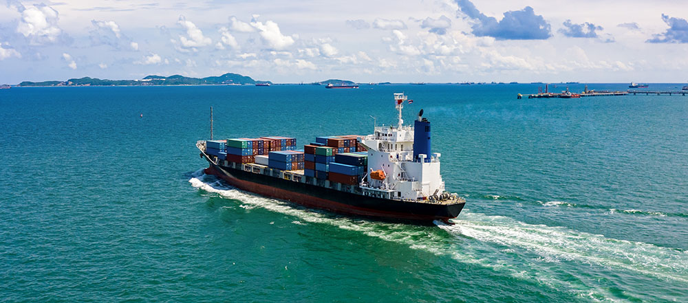 Cargo ship carrying containers at sea