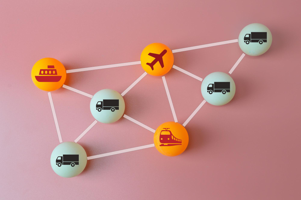 connected-logistics-supply-chain-concept-table-tennis-ball-with-plane-trucks-train-ship-symbol-connected-with-lines