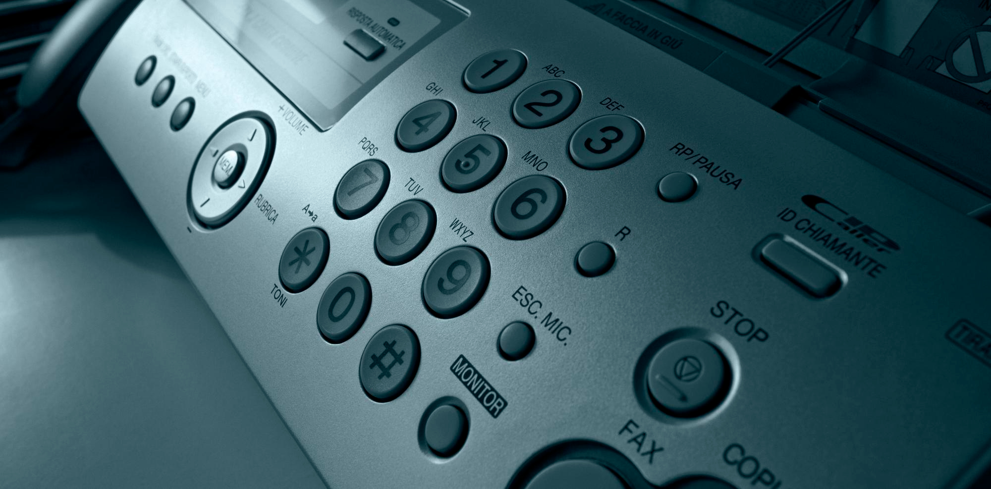 Close-up view of fax machine keypad.