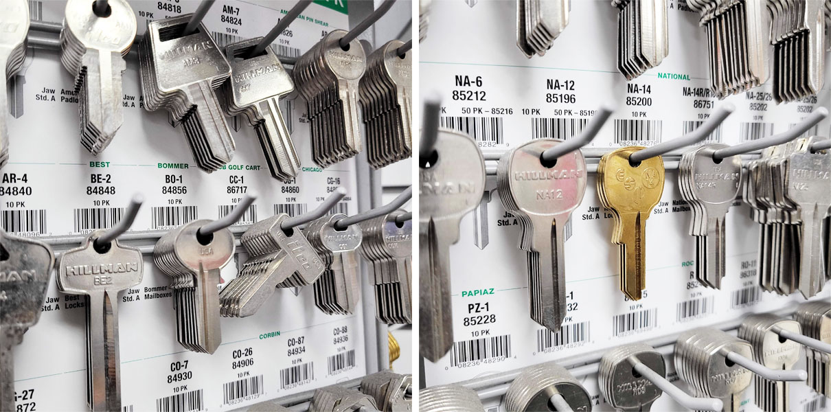 Assorted keys hanging on a labeled store rack.
