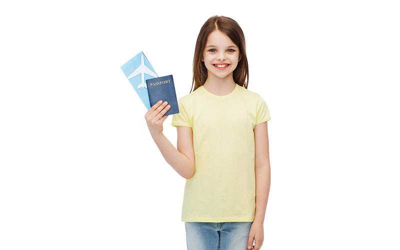travel-holiday-vacation-childhood-transportation-concept-smiling-little-girl-with-airplane-ticket-passport copy